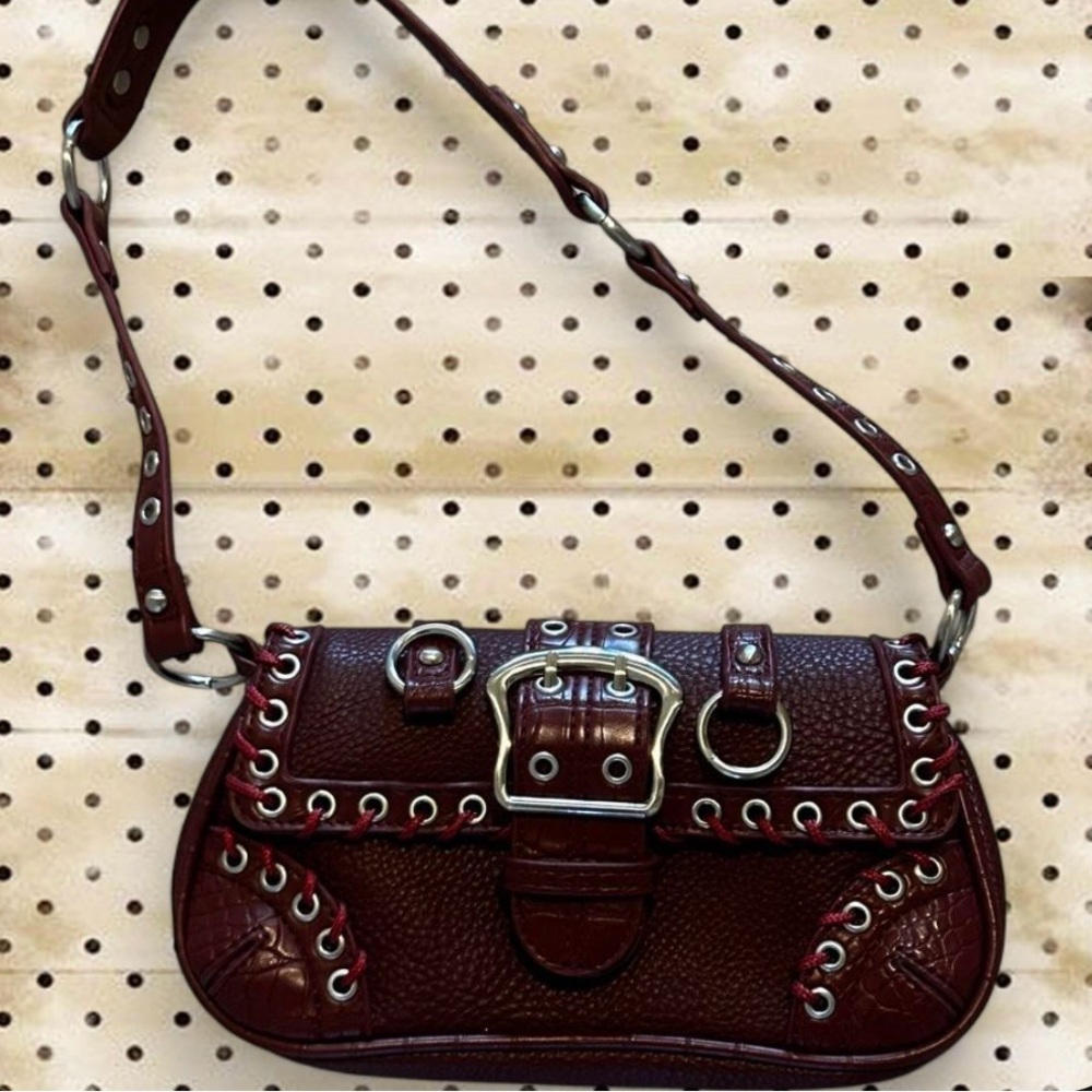 Burgundy grommet shoulder bag 🐞